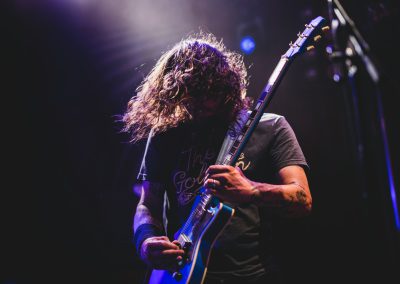 man playing electric guitar